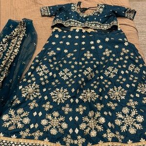 Emerald green lehenga dress with Gold Embroidery